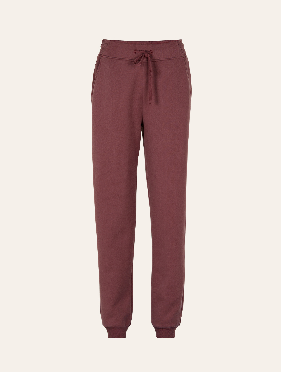 Rote Yogahose vor weißem Hintergrund